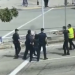 Singapore Police Sadistic Action; Beat a Man in the Middle of the Road