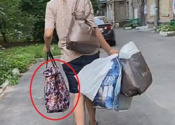 Singing Lullaby Song into a Plastic Bag, This Young Mother is Turning Out Doing Horrified Thing