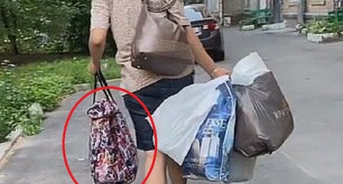 Singing Lullaby Song into a Plastic Bag, This Young Mother is Turning Out Doing Horrified Thing