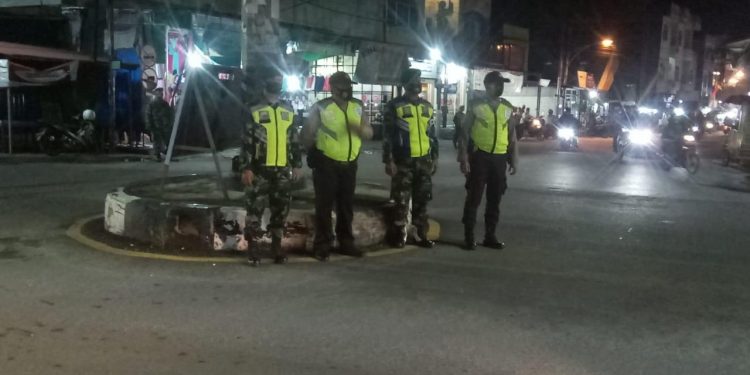 The Task Force of Indragiri Hilir Enforce the Discipline of the Health Protocol