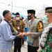 Protecting the Jamaah, Kapolres and Damdim of Indragiri Hilir Distribute Masks