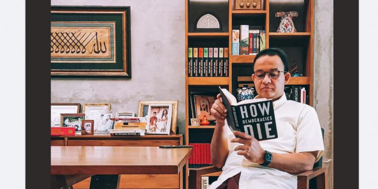 A Photo of Anies Baswedan Reading How Democracies Die Book has Sparked Debate Among Social Media Users