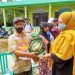 The Head of PLN and the Vioni Brothers Foundation Visit the Fire Victims in Indragiri Hilir Regency