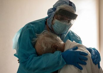 A Poignant Photo of an Intensive Care Doctor Embracing a Coronavirus Patient Went Viral