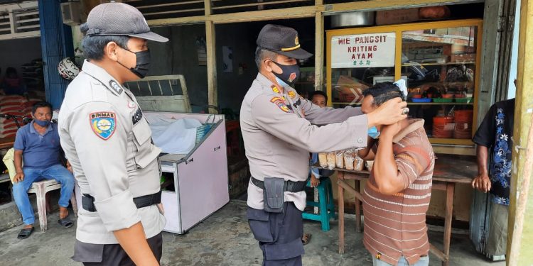 District Health Protocol Discipline Enforcement Task Force of Indragiri Hilir Conducted a Large-scale Joint Raid