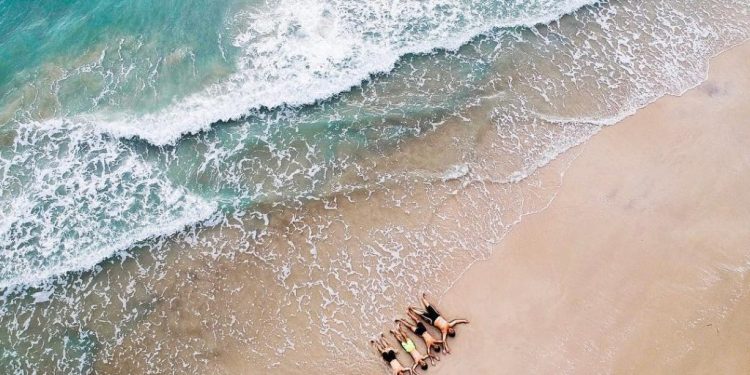 Enjoying the Blue and Lightning Dusk on Tikus Beach