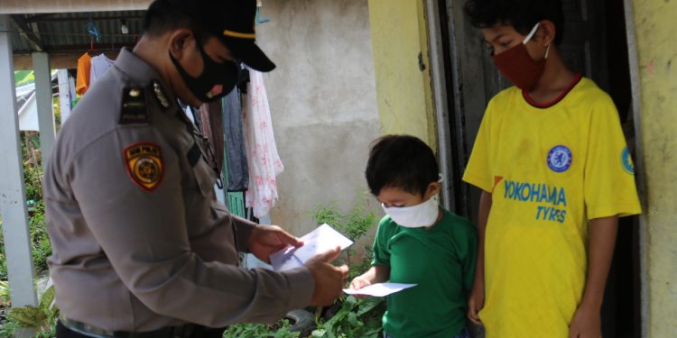 Resort Police of Indragiri Hilir Provided Assistance to 50 Orphans