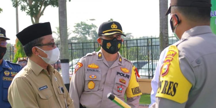 The Regional Secretary of Siak Becomes the Ceremony Inspector at the Implementation of the Troops Ceremony at the Siak Police