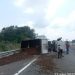 Truk Bermuatan Biji Sawit Terbalik di Tol Permai